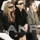 Victoria Beckham and L'Wren Scott attend the Chanel fashion show during Paris Fashion Week (Haute Couture) Spring/Summer 2006 on January 24, 2006 in Paris, France - 319 x 500