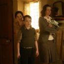 Emily Watson as Anne MacMorrow, Alex Etel as Angus and Priyanka Xi as Kirstie MacMorrow in Columbia Pictures' The Water Horse: Legend of the Deep.