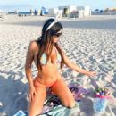 Claudia Romani – Posing on the beach in Miami