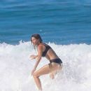 Gisele Bündchen – In a bikini Hits the waves in Costa Rica