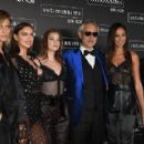 Man of the hour: The beauties also posed beside operatic legend Andrea Bocelli, who performed at the star-studded bash - 454 x 289