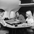 Hugh Hefner, Victor Lownes, and Connie Kreski on Playboy Private Jet 1971 - 454 x 447