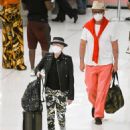 Cyndi Lauper – With husband David Thornton arrive at JFK Airport in New York - 454 x 573