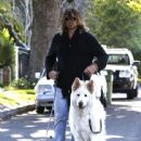 Billy Ray Cyrus takes his dogs out for a relaxing stroll through his neighborhood in Toluca Lake, California on April 4, 2014 - 442 x 594