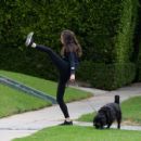 Troian Bellisario – Out for a walk with her dog in Los Angeles - 454 x 427
