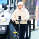 Deborra-Lee Furness – Riding an electric scooter through New York - 454 x 682