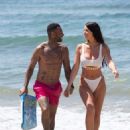 Alice Goodwin in White Bikini on the beach in Marbella