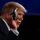 President Trump puts on his mask - 454 x 255