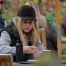 Alice Eve – Stopping for a chocolate croissant in London - 454 x 303
