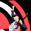 Tom Morello of Prophets of Rage performs onstage during KROQ Almost Acoustic Christmas 2017 at The Forum on December 9, 2017 in Inglewood, California - 435 x 600