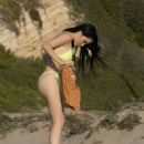 Claudia Alende in Yellow Bikini on the beach in Los Angeles - 454 x 681