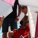 Amber Rose in Black Bikini on the beach in Miami