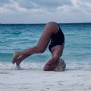 Ilary Blasi in Swimsuit – Doing yoga at the Maldives - 454 x 605
