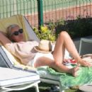 Denise Van Outen – In a bikini at a tennis club pool in Marbella - 454 x 302