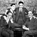 Irving Thalberg  New executives at Universal City  Bernstein producing manager Sam Van Ronkle assistant manager standing Louis Loeb financial manager and Irving Thalberg, west coast studio manager May 8, 1920 - 423 x 336