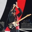 Tom Morello of Prophets of Rage performs onstage during KROQ Almost Acoustic Christmas 2017 at The Forum on December 9, 2017 in Inglewood, California - 454 x 356