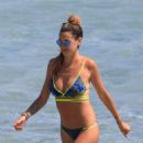 Melissa Satta – Bikini candids at the beach in Ibiza