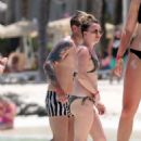 Candice Brown – In a bikini Hits the beach in Cancun - 454 x 587