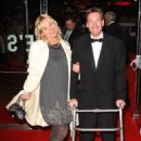 BBC security correspondent Frank Gardner and wife Amanda arrive at The Times BFI 51st London Film Festival gala screening of 'Lions for Lambs' at the Odeon Leicester Square on October 22, 2007