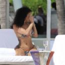 Draya Michele – In bikini on the beach in Cancun