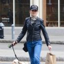 Julianna Margulies – Wearing a black biker’s leather jacket in Manhattan’s SoHo area - 454 x 696