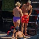 Caroline Stanbury – Seen In a purple bikini with her husband Sergio Carrallo at Mykonos - 454 x 681