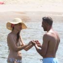Nina Zilli and Omar Hassan – Seen on vacation on the beach in Provence-Alpes-Côte d’Azur - 454 x 681