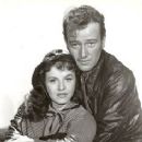 John Wayne and Paulette Goddard
