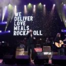 Chris Robinson and Rich Robinson perform on stage during the Fourth Annual LOVE ROCKS NYC benefit concert for God's Love We Deliver at Beacon Theatre on March 12, 2020 in New York City - 454 x 302