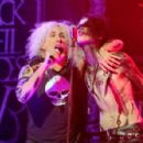 Dee Snider and Andy Biersack perform on stage during the 2012 Revolver Golden Gods Award Show at Club Nokia on April 11, 2012 in Los Angeles, California