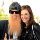 ZZ Top frontman Billy Gibbons and wife Gilligan attend the GBK American Music Awards Gifting Lounge at the SLS Hotel in Beverly Hills.
