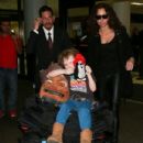 Minnie Driver and her son Henry Story Driver are seen at LAX airport