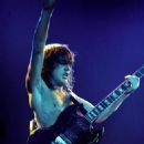 The Young brothers of AC/DC performing in Lakeland, Florida; August 22, 1980 - 454 x 608