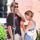Millie Bobby Brown – Flashes a diamond ring while on the PDA with boyfriend Jake Bongiovi - 454 x 586