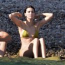 Kendall Jenner – In a olive green bikini in Ponza