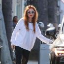 Isla Fisher in Black Leggings – Out in Beverly Hills - FamousFix