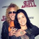 Steven Adler and Carolina arrive at the special screening of 