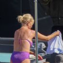 Caroline Stanbury – Seen In a purple bikini with her husband Sergio Carrallo at Mykonos - 454 x 681