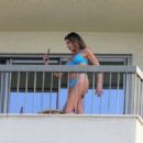 Luciana Gimenez – In a blue bikini on the balcony of her hotel in Rio de Janeiro - 454 x 324