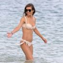 Audrina Patridge – In bikini at the beach in Hawaii - 454 x 303