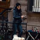 Julianna Margulies – Enjoys a stroll with her pooch in New York - 454 x 553