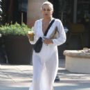 Yolanda Hadid – In white dress while out shopping at the Vitamin Barn in Malibu
