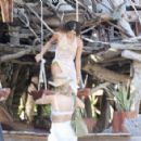 Maura Higgins – In orange bikini on the beach in Tulum