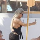 Bianca Gascoigne – Seen in a black swimsuit at Ibiza’s Cala de Bou beach