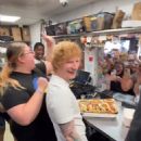 Ed Sheeran gave some lucky fans the surprise of a lifetime after stepping behind the counter of an iconic hotdog stand on the north side of Chicago
