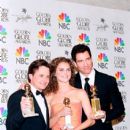 Michael J.Fox, Keri Russell and Dylan McDermott attends The 56th Annual Golden Globe Awards - Press Room (1999) - 406 x 612