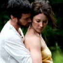Evangeline Lilly and Romain Duris