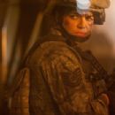 Michelle Rodriguez as TSgt. Elena Santos in Battle Los Angeles