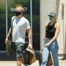 Miley Cyrus and boyfriend Cody Simpson – Shopping in Calabasas