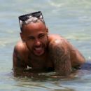 NEYCATION Neymar relaxes in the sea as stunning sister and bikini-clad girlfriend Bruna Biancardi enjoy themselves on holiday